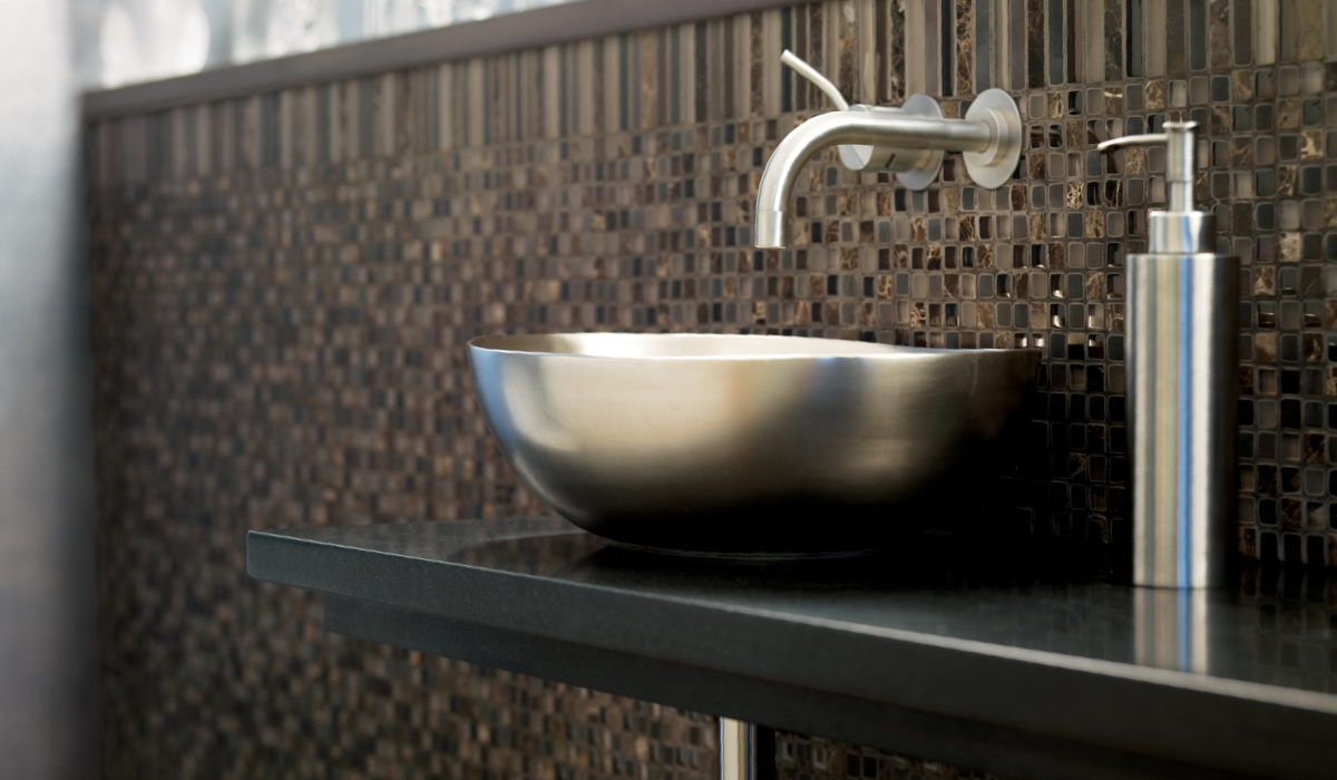 Ebb & Flow Stone and glass mosaics on spa backsplash