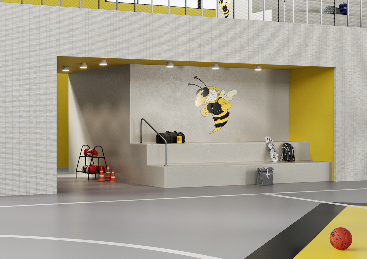 Resilient flooring on school gym floor adn porcelain tile on walls