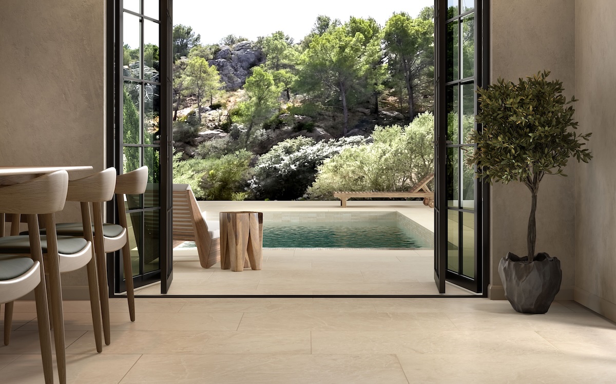 Reunited porcelain tile in exterior and interior finish flowing from indoors to outdoors