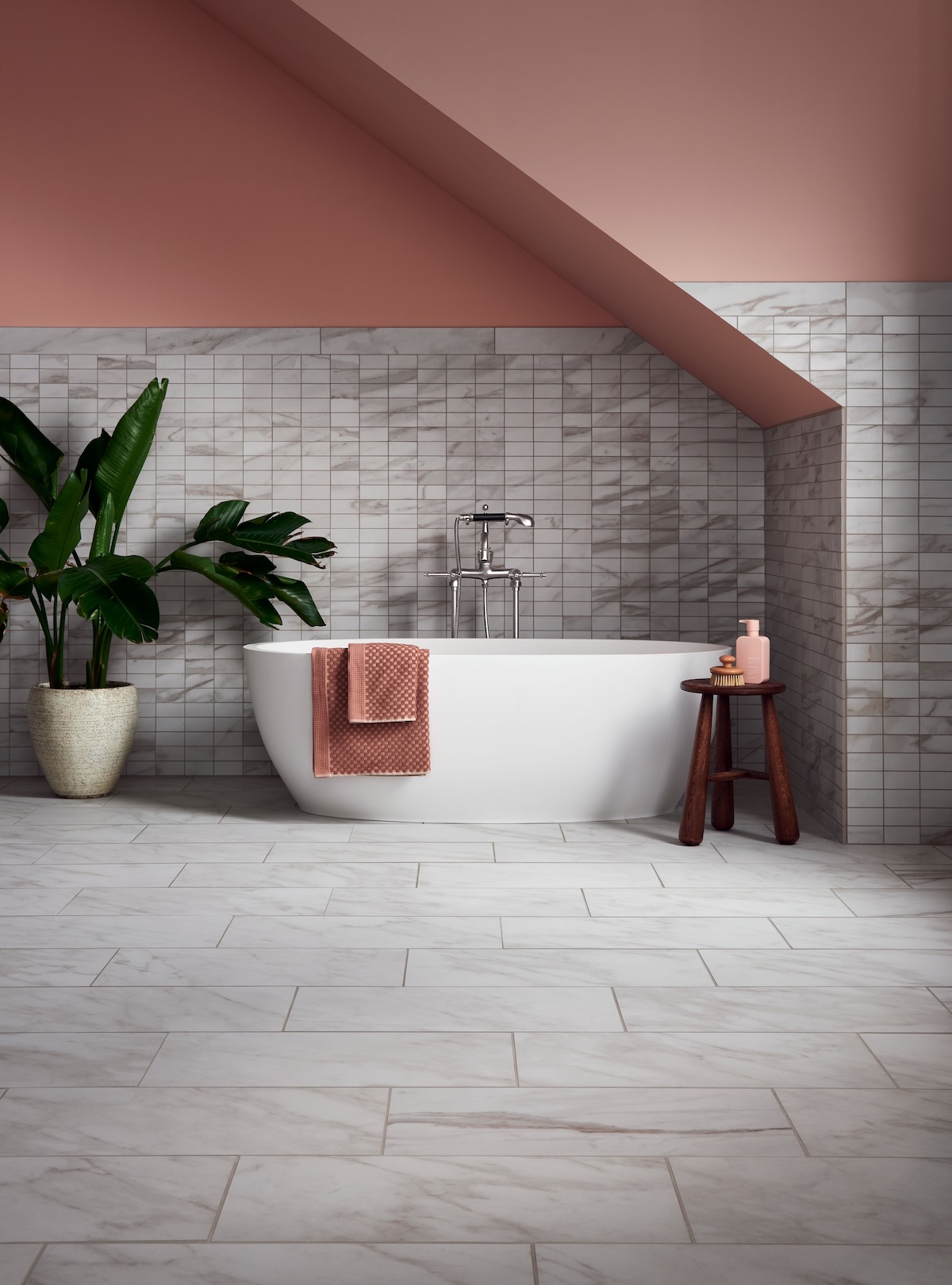 Reunited stacked 2" x 4" porcelain mosaics on bathroom wall