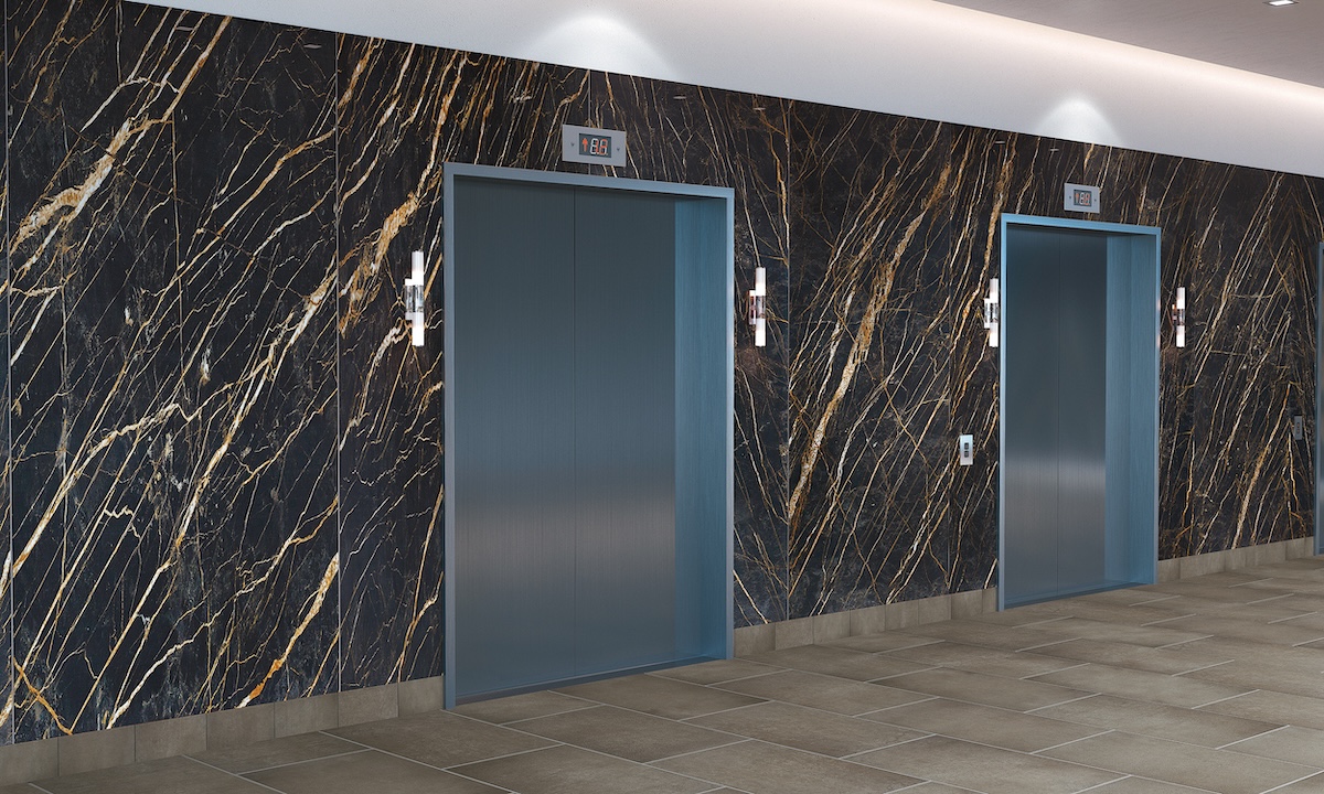 Cava dark heaviliy veined porcelain panels in hotel lobby elevator bank walls 
